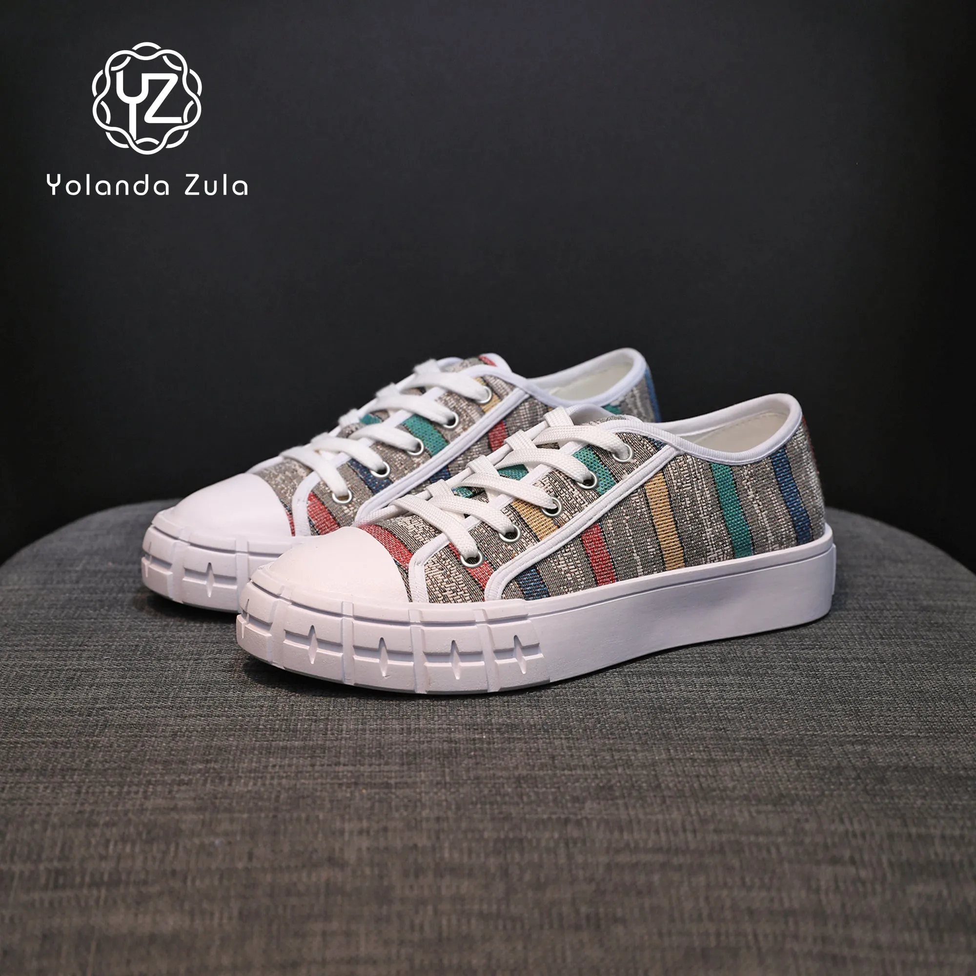 Gray sole colored striped canvas shoes