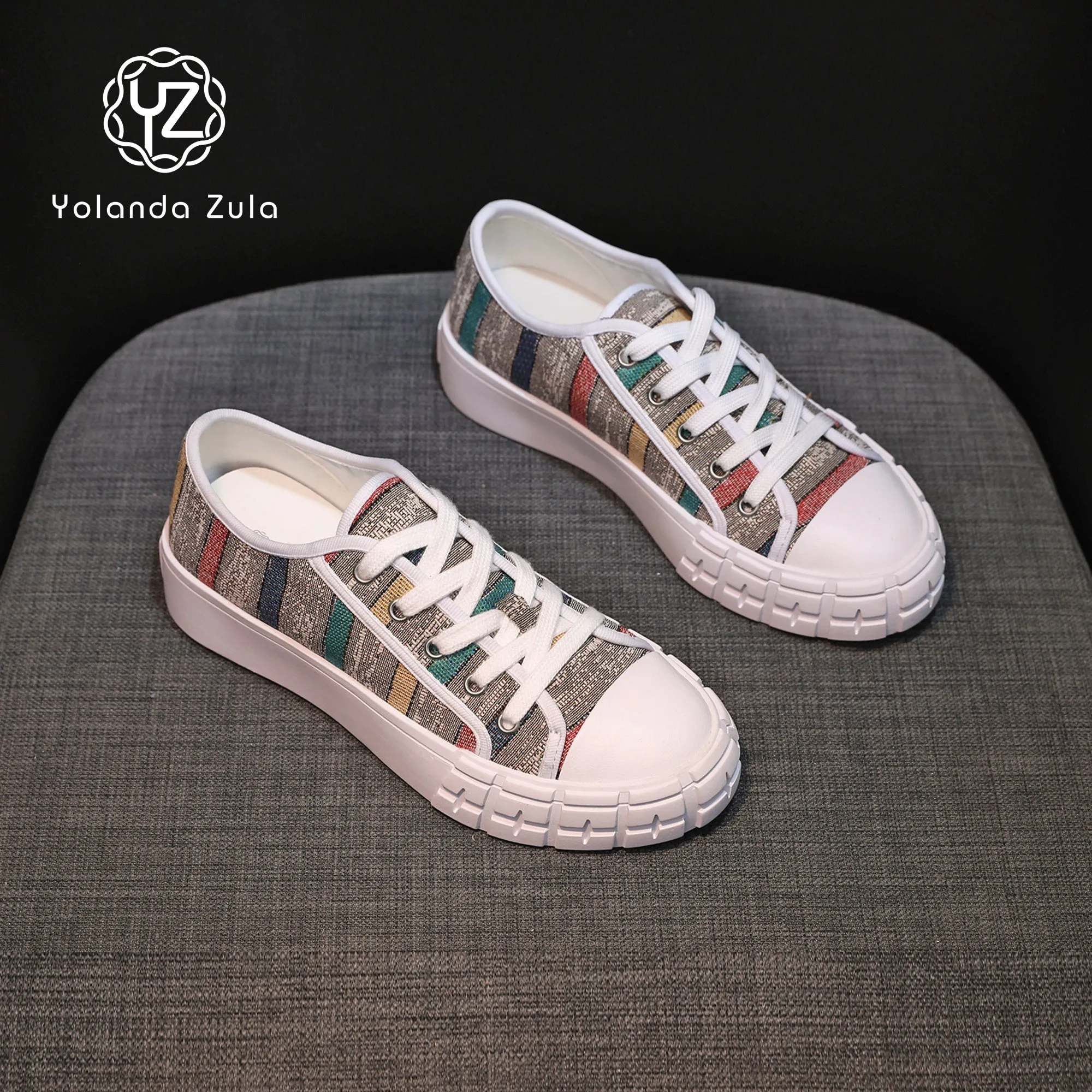 Gray sole colored striped canvas shoes